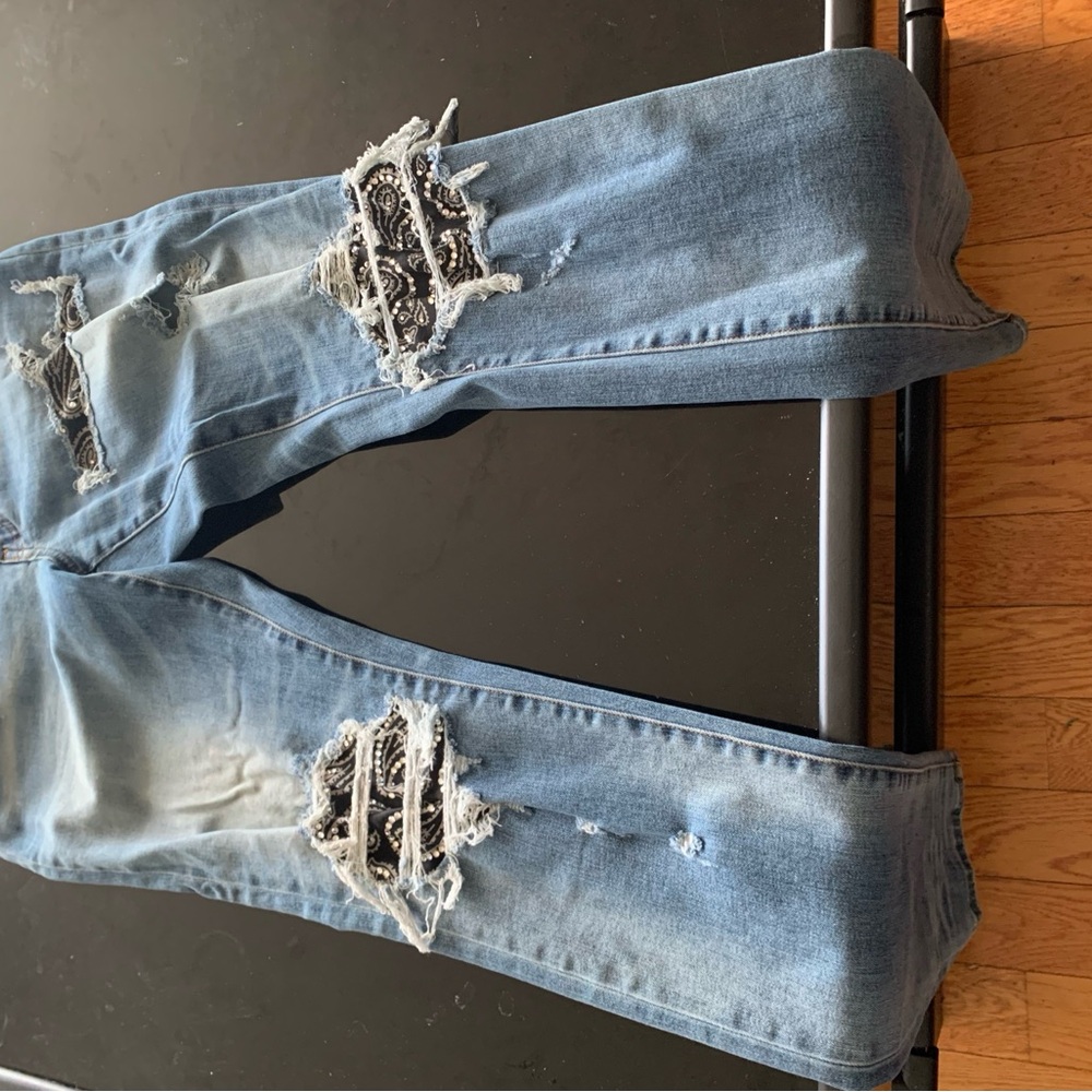 AMIRI Light Blue Distressed Boyfriend Jeans with Black Bandana Patch